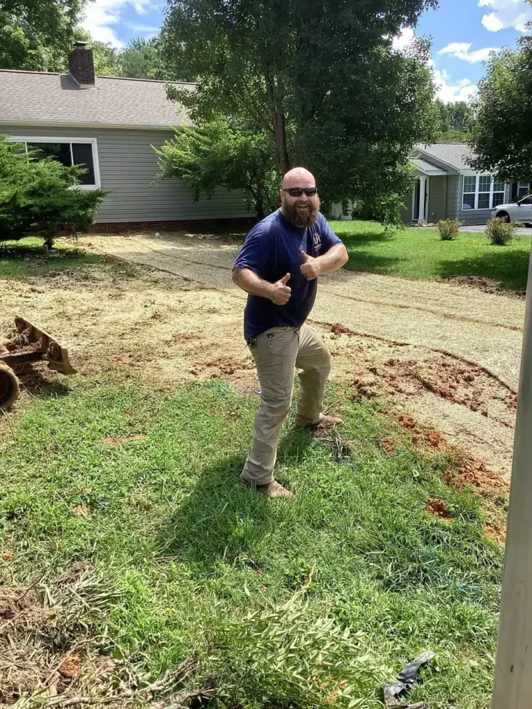 Plumbing Authority tech outside with thumbs up