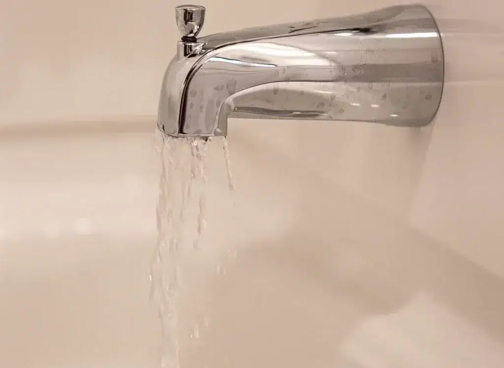 Water flowing out of bathtub faucet in Knoxville, TN.