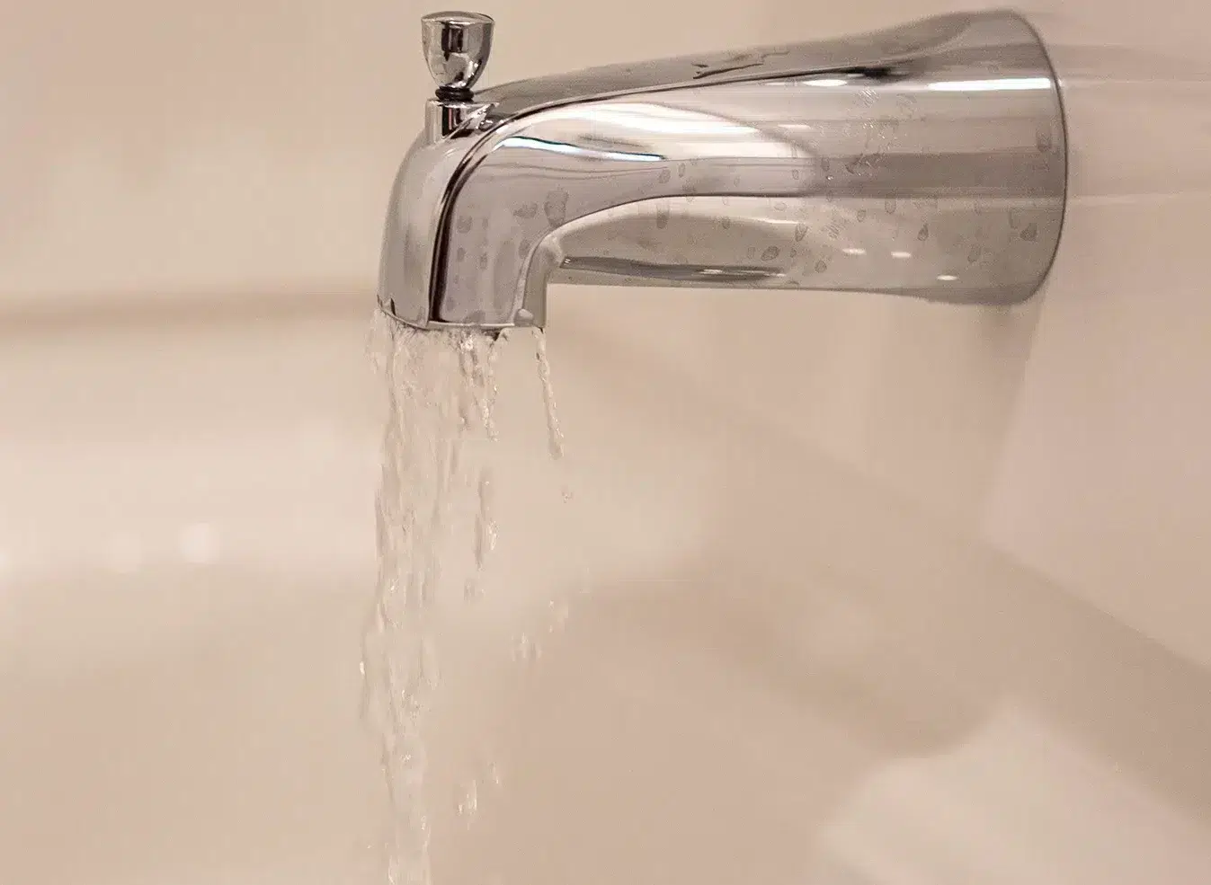 Water flowing out of bathtub faucet in Knoxville, TN.