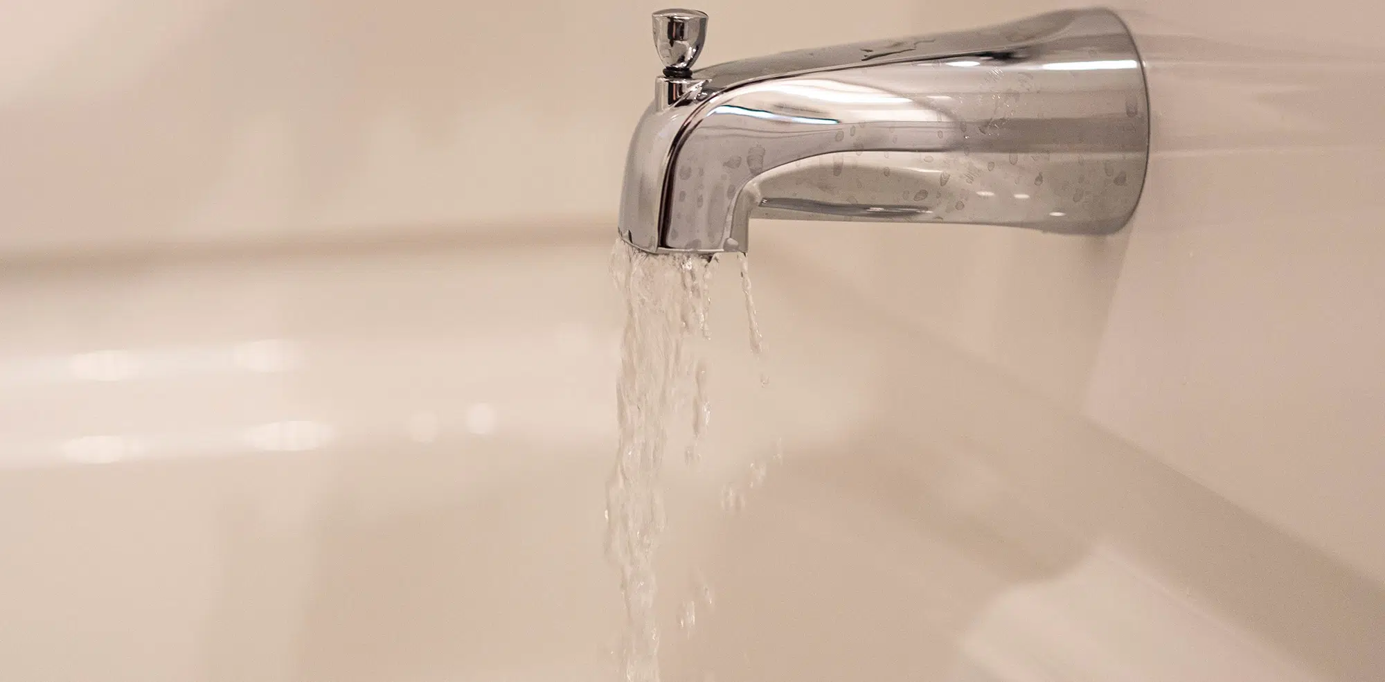 Water flowing out of bathtub faucet in Knoxville, TN.
