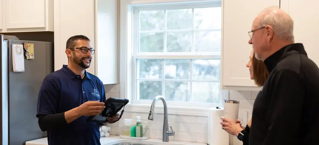 tech talking to customer