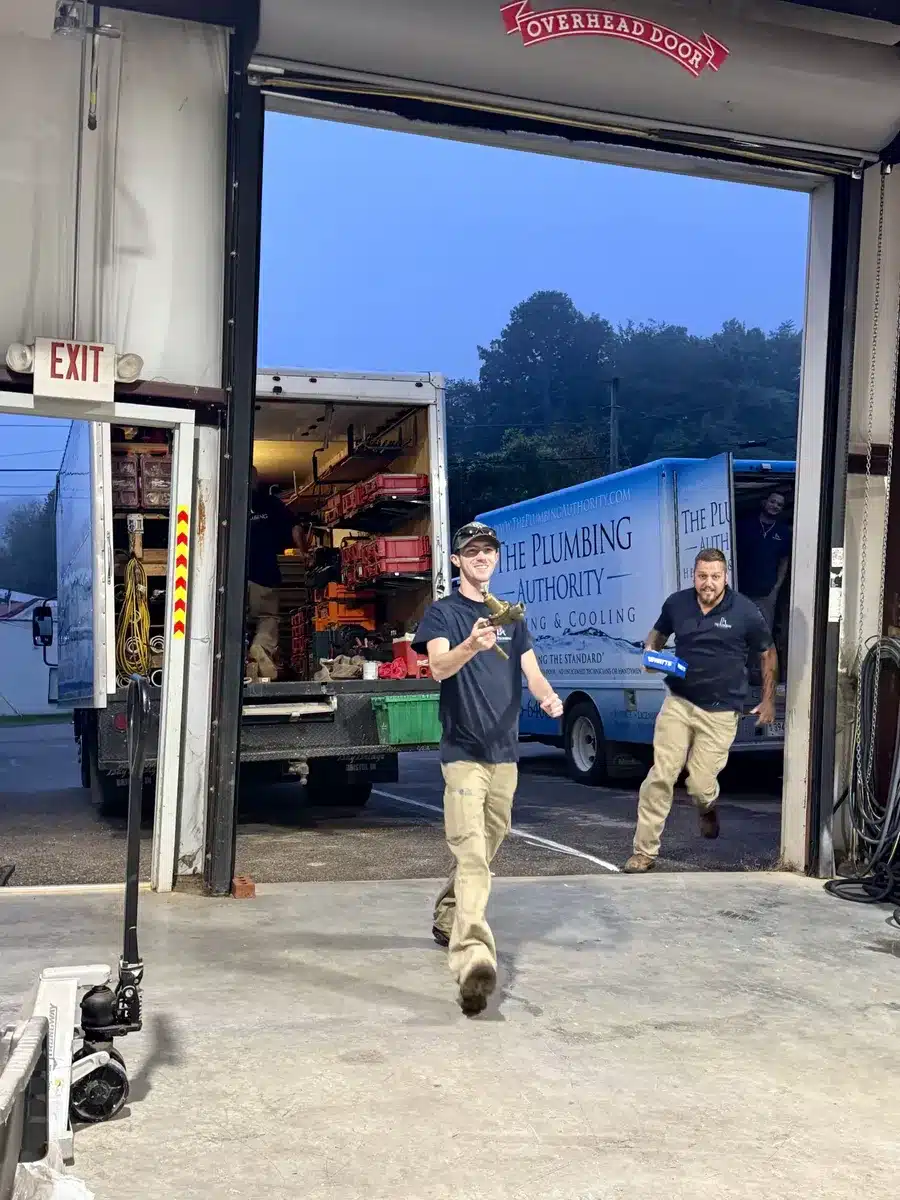 Crew member unloading equipment from the truck during a Winning Wednesday activity